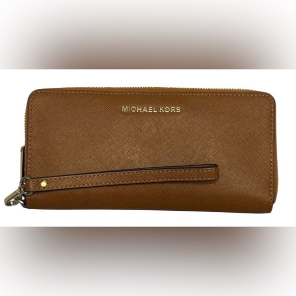 Michael Kors Handbags - Michael Kors Jet Set Travel Continental Zip Around Wallet in Brown